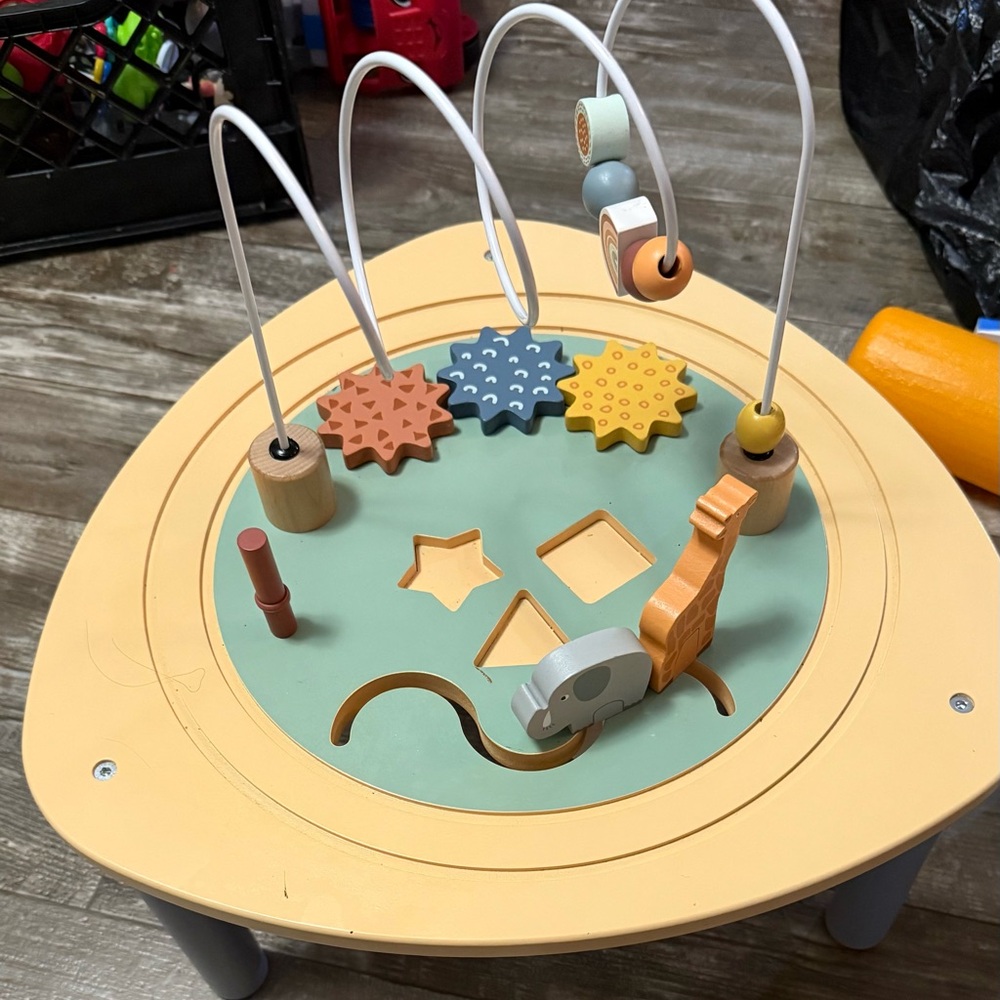 Interactive Wooden Activity Table with Pastel Accents